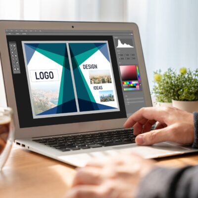 Graphic designer software for modern design of web page and commercial ads showing on the computer screen